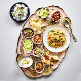 Gelbes Hühnercurry mit Basmatireis und Condiments