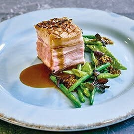 Spannferkel mit Fisolen