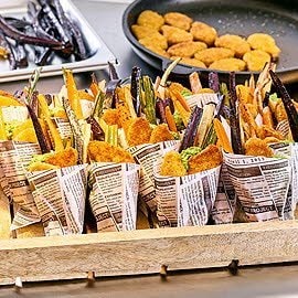 NoChicken Nuggets mit Erbsenpüree und gebackenem Wurzelgemüse